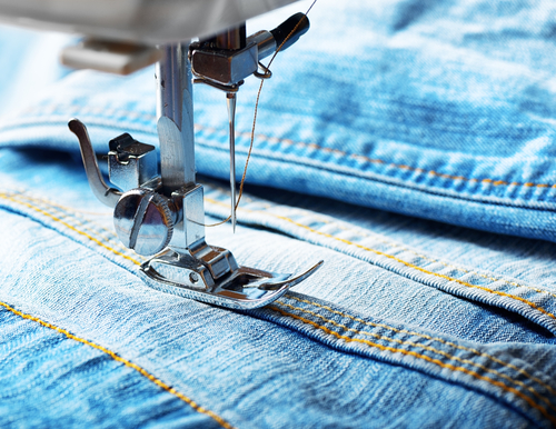 Tailoring the jeans' wasitband is easy for the experienced tailor.